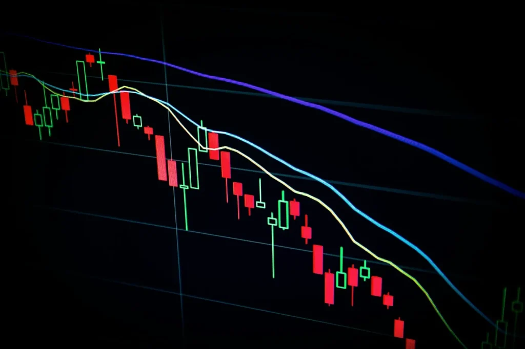 What Would Settle the AI Bubble Debate? Follow the Revenue, Not the Rhetoric A stock market chart displayed on a trading screen in an office.