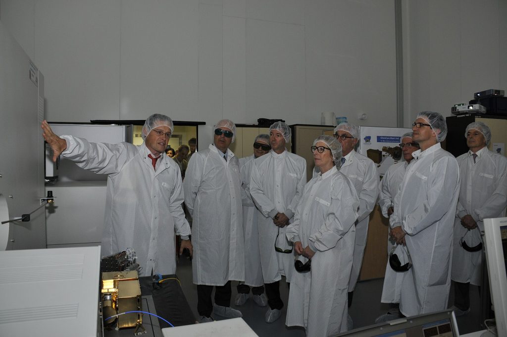 Japan Plans $21 Billion Investment in GlobalFoundries New York Chip Factories Semiconductor factory clean room with silicon wafer production equipment